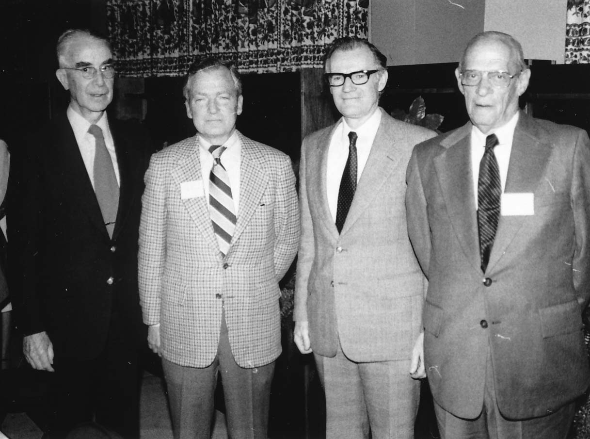 1980 Board of Visitors, L to R: Robert Tate, Marvin Bower, Robert Eckley (IWU President), and Herbert Livingston