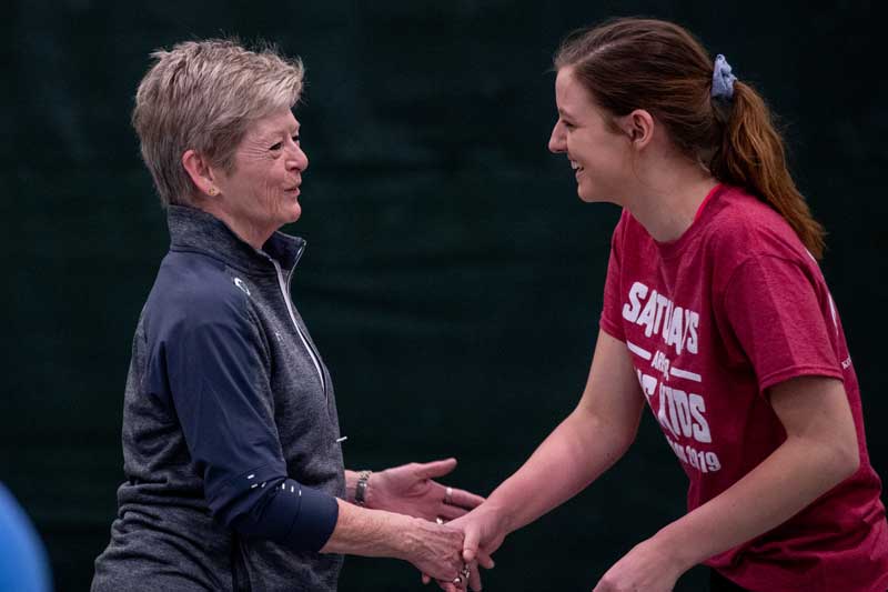 President Georgia Nugent connects with Titan athletes.