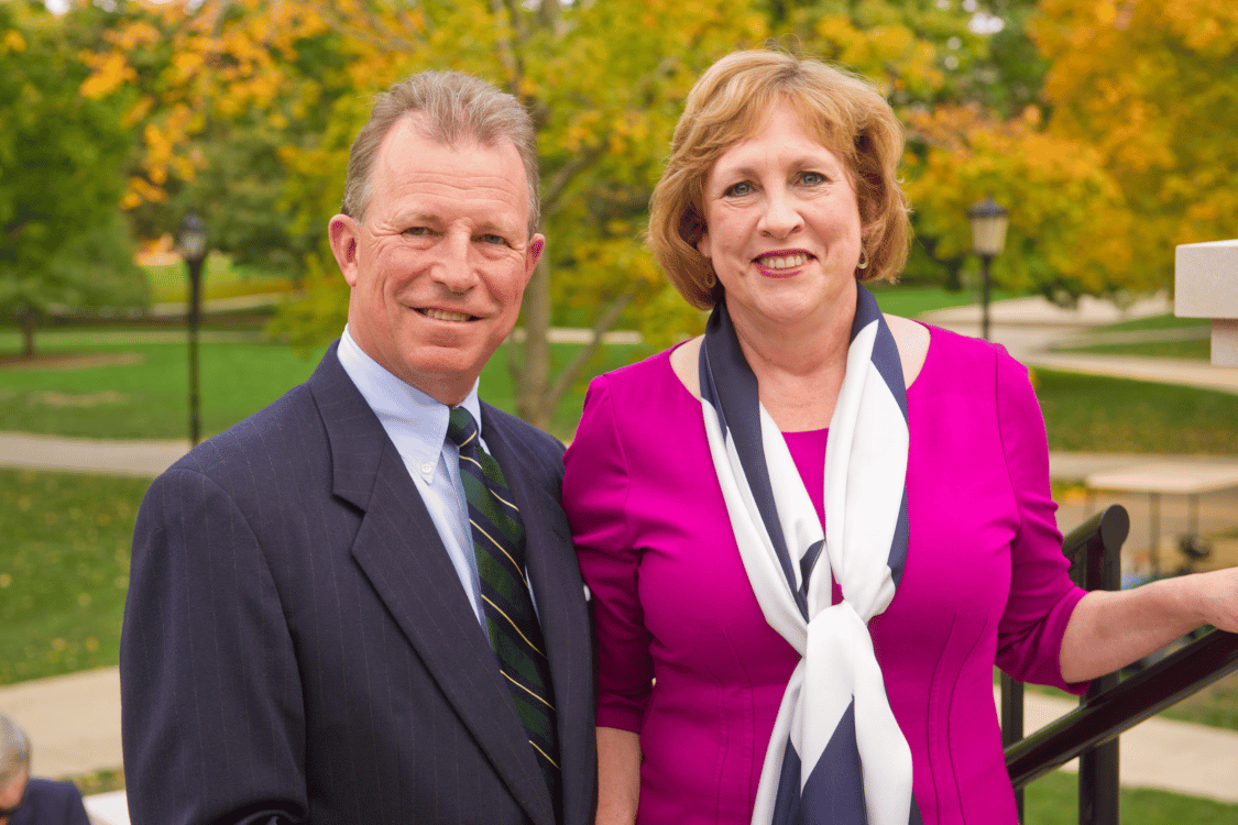 Herb and Susan Getz standing on IWU quad