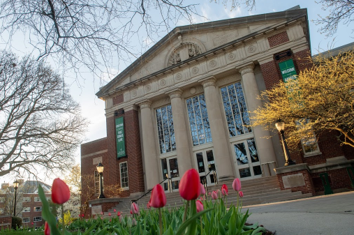 Hansen Student Center with flowers blooming on a spring day.