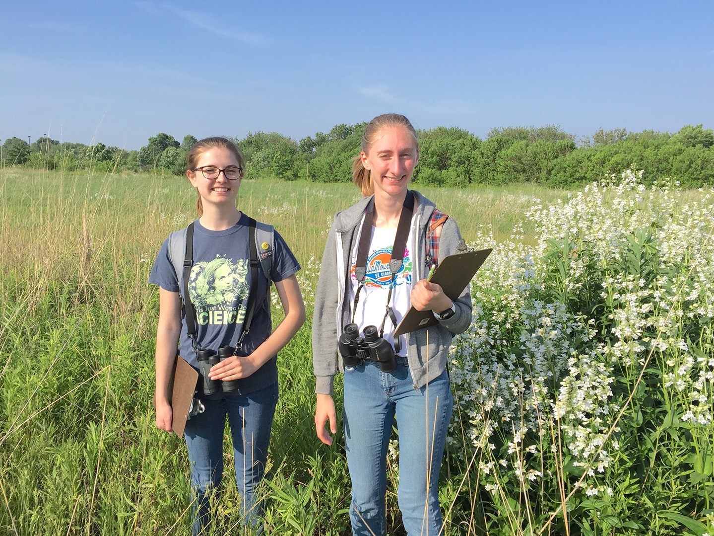 Leah Bieniak ’21 and Rachel Schoeneker ’20 out in the field “Determining Species Abundance and Habitat Preferences of Breeding Birds in Bloomington-Normal, Illinois.”