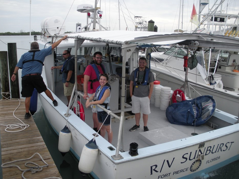 Students collecting and identifying invertebrate larva from the Gulf Stream