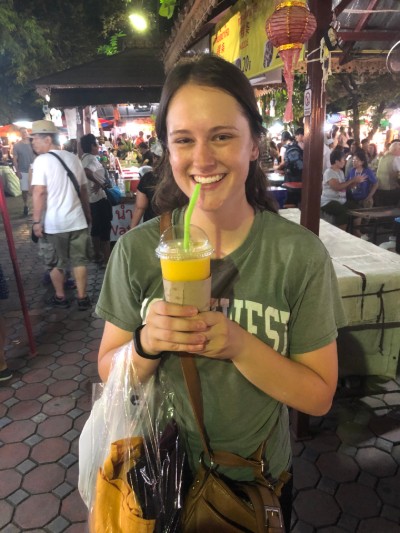 Annika relaxes at a street market