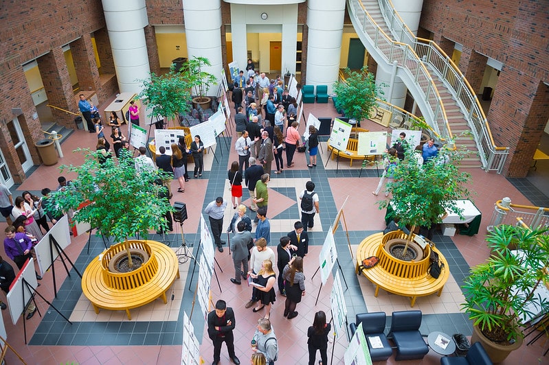 Image from above of students presenting posters