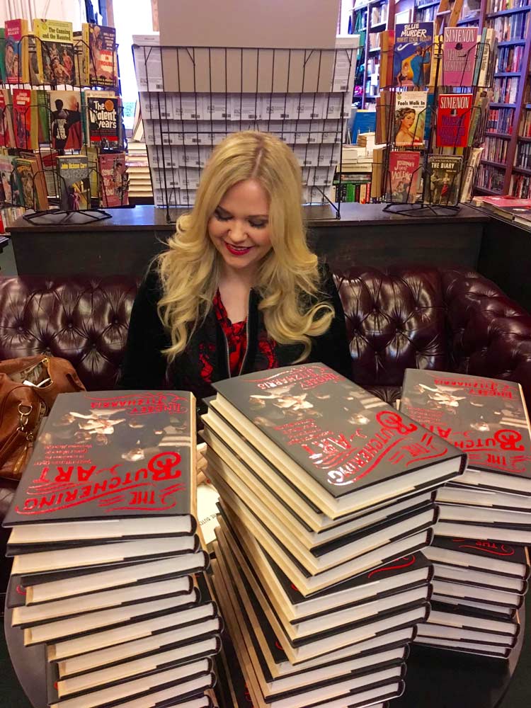 Lindsey Fitzharris ’04 signs copies of The Butchering Art at a stop on her book tour in New York City in November 2017.