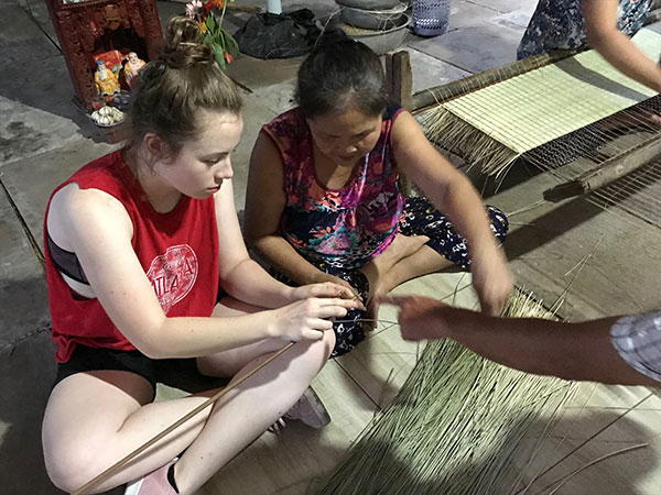 Student Learning to Weave a Mat