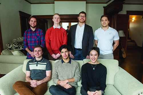 Marc Talluto ’94 poses with past and present student interns at Wesleyan Manor. 