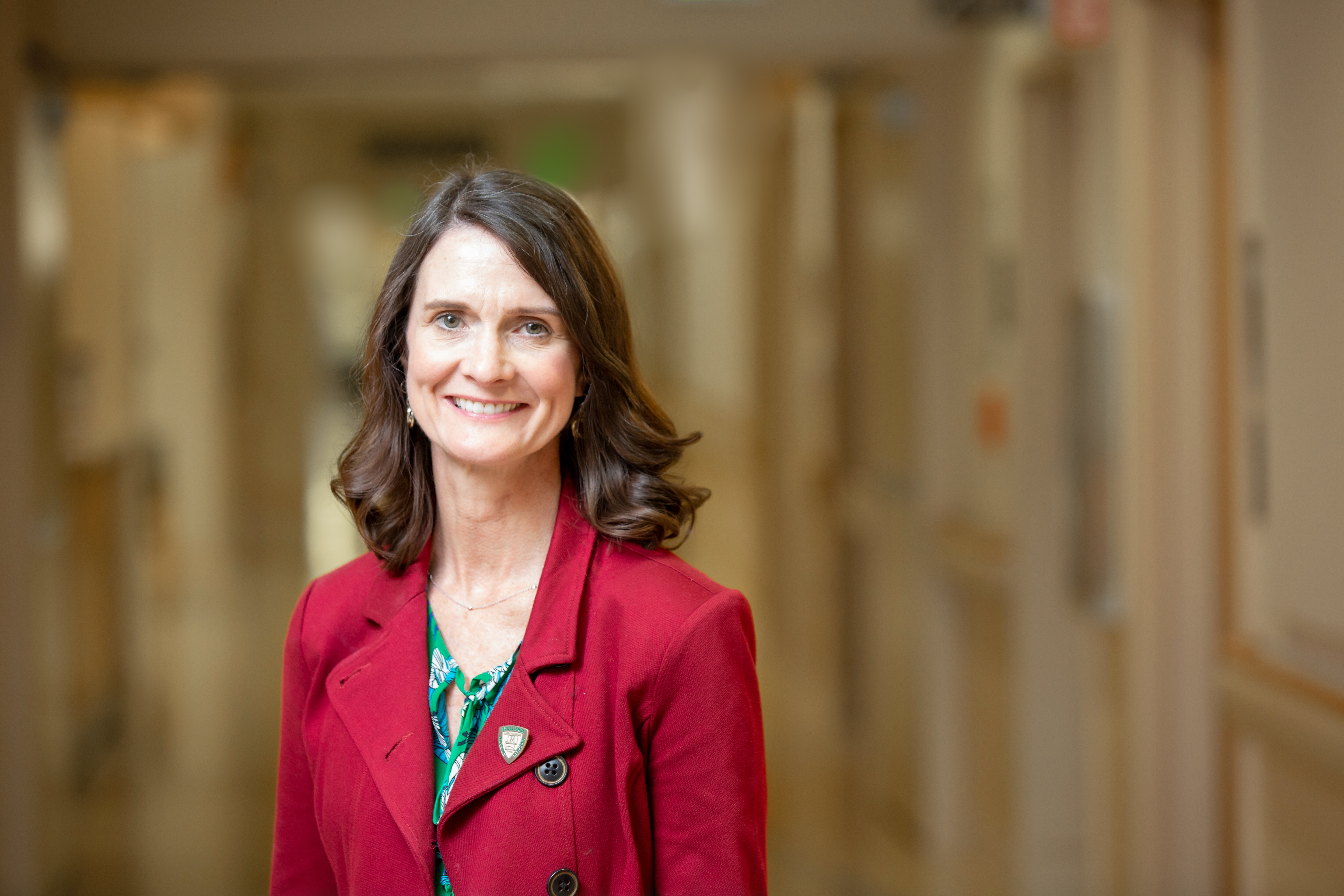 Cheryl (Wallace) Reinking ’87 poses at El Camino Health, where she oversees more than 2,000 front line healthcare workers.