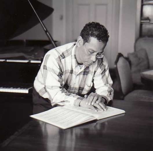 Larey works in his office at the University of Cape Town, where he served as director of UCT’s South African College of Music.