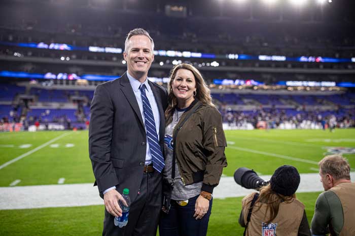 Burke ’00 and Holly (Munch) Nihill ’00 pose for a photo before the Tennessee Titans’ 2019 playoff game at Baltimore’s M&T Bank Stadium.