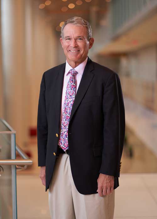 Dr. William Farrar ’71, Illinois Wesleyan’s 2021 Distinguished Alumni Award winner, poses for a photo on the campus of the Wexner Medical Center.