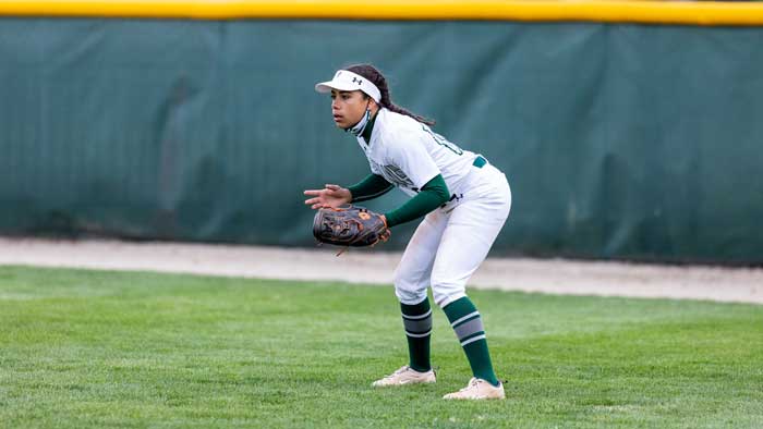 A member of the Illinois Wesleyan softball team, Madison Moore ’23 is thankful for opportunities created by Title IX, but also aware of the work that remains.