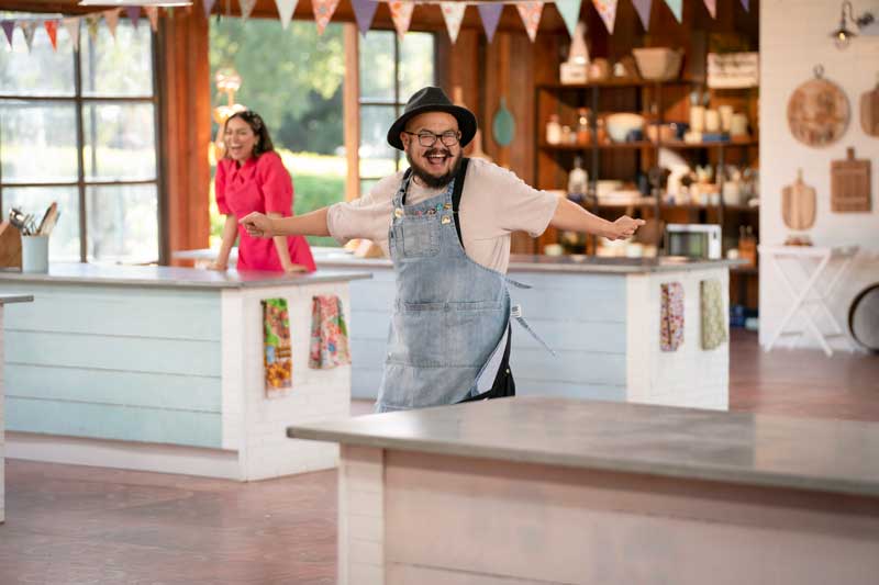 Dr. Nurman Noor '08 celebrates being named “Star Baker” during the penultimate episode of The Great Australian Bake Off.