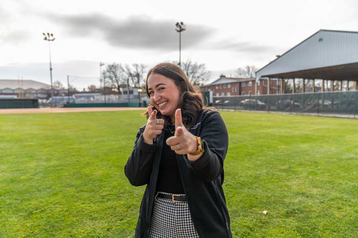 Toni walks across her old softball field while visiting campus during fall 2022. She has learned to take care of her own health and happiness, as well as others’, since her cancer diagnosis.