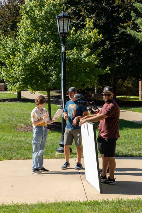 The College Tour crew prepares to film featured student Emily Gilson ’23