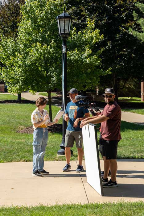 The College Tour crew prepares to film featured student Emily Gilson ’23