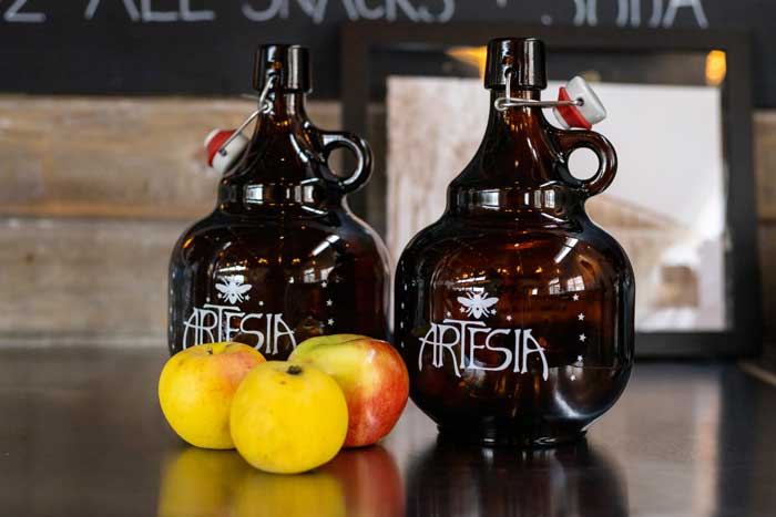 For now, Artesia only sells their alcohol from the tap and in branded growler jugs.