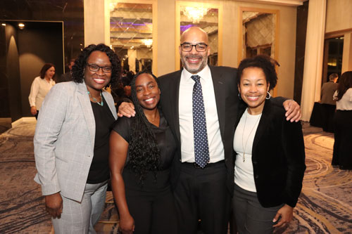 Jeremy celebrates the confirmation of his appointment as a federal judge in the Northern District of Illinois with friends and family, including his wife, Silver (Rayside) Daniel ’00 (second from left).