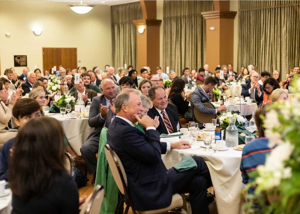 Guests of the 2022 Scholarship Benefactor Dinner celebrate the value of an Illinois Wesleyan University education.