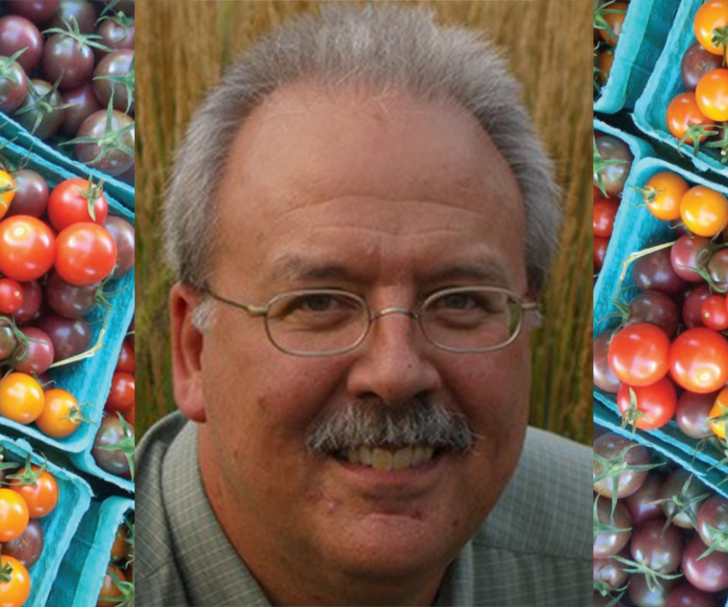 Ken Meter headshot with tomatoes