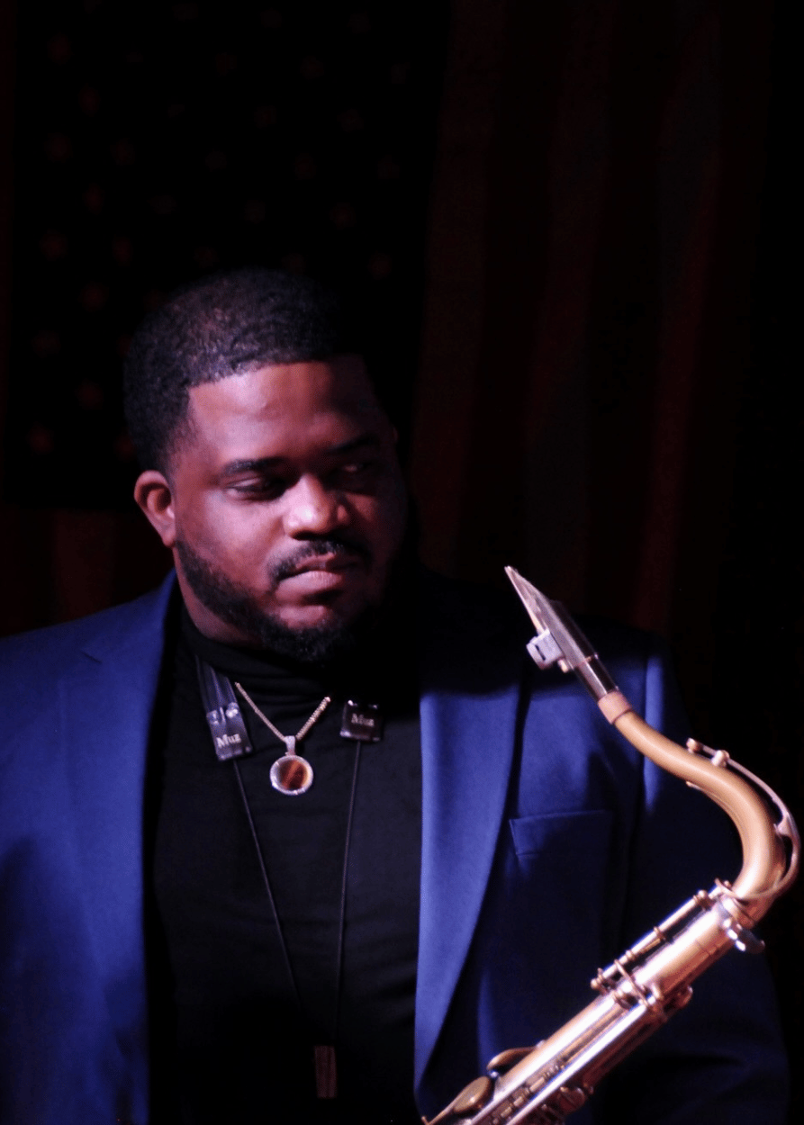 Reginald Lewis with saxophone
