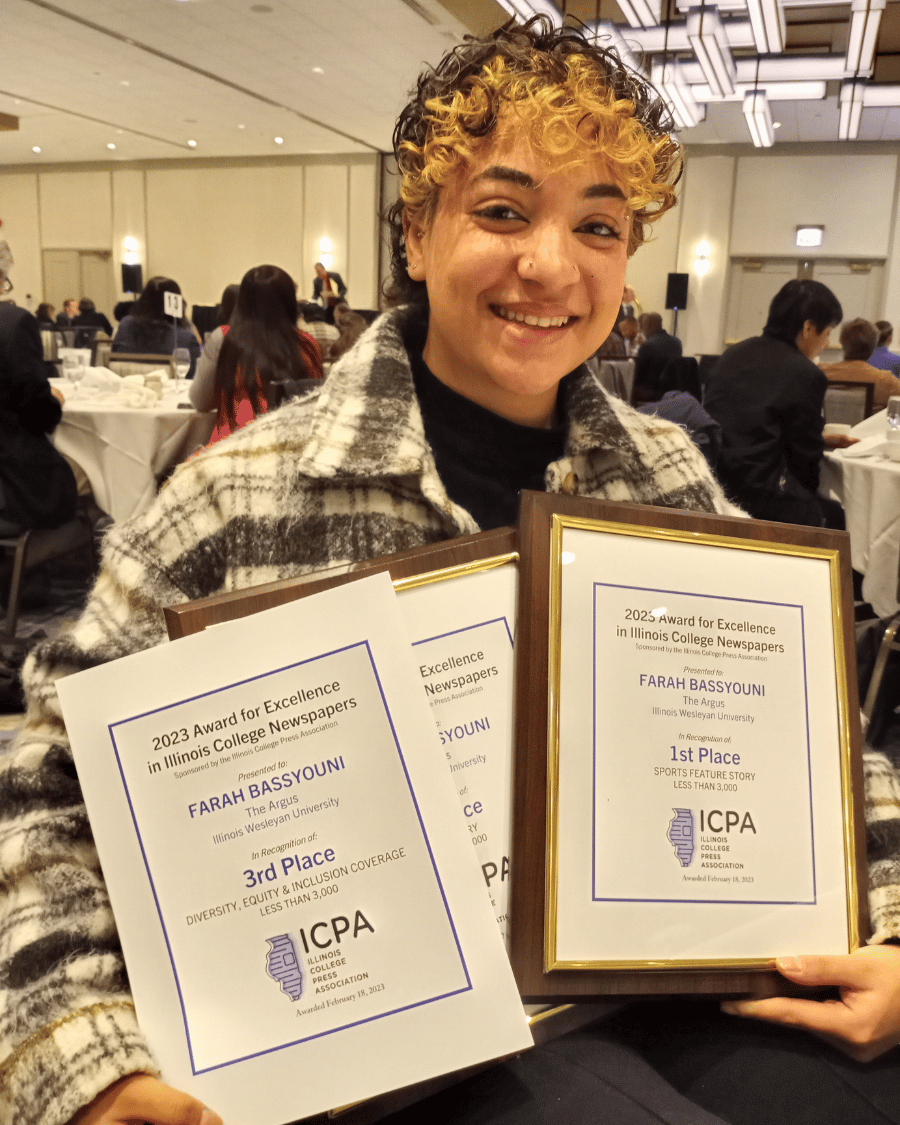 The Argus news editor Farah Bassyouni '25 poses with awards received from the ICPA