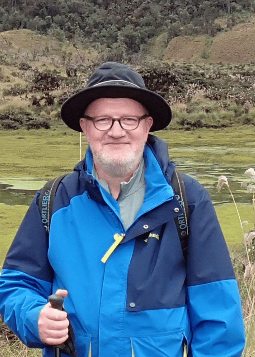 Edgar Lehr standing near marsh in Peru