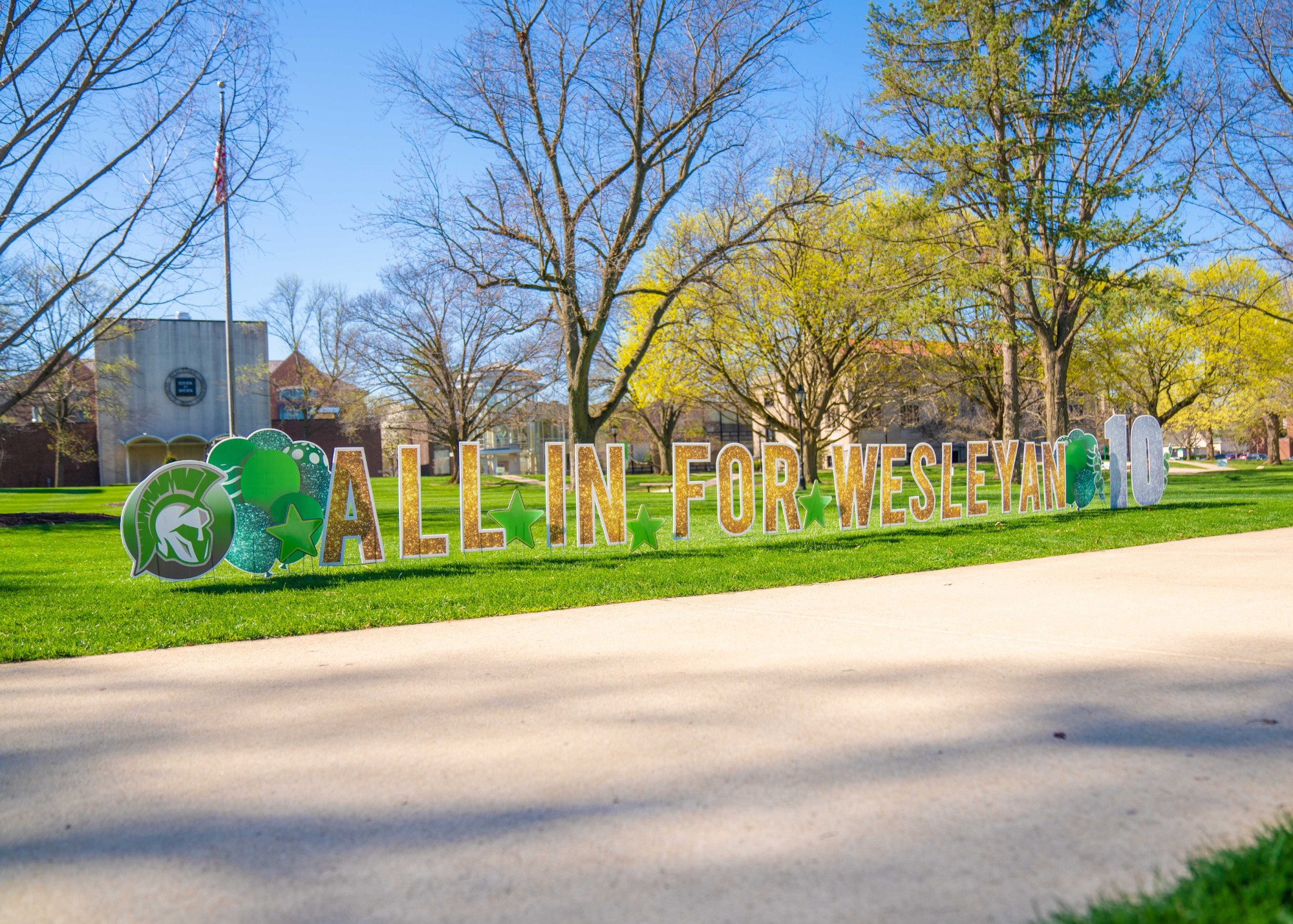 all in for wesleyan yard sign on the quad