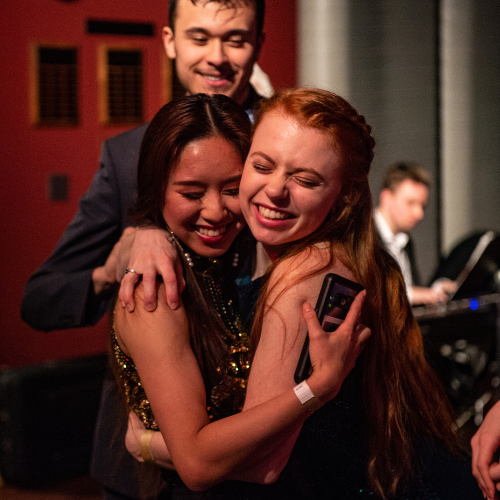 Students embracing during past Unity Gala