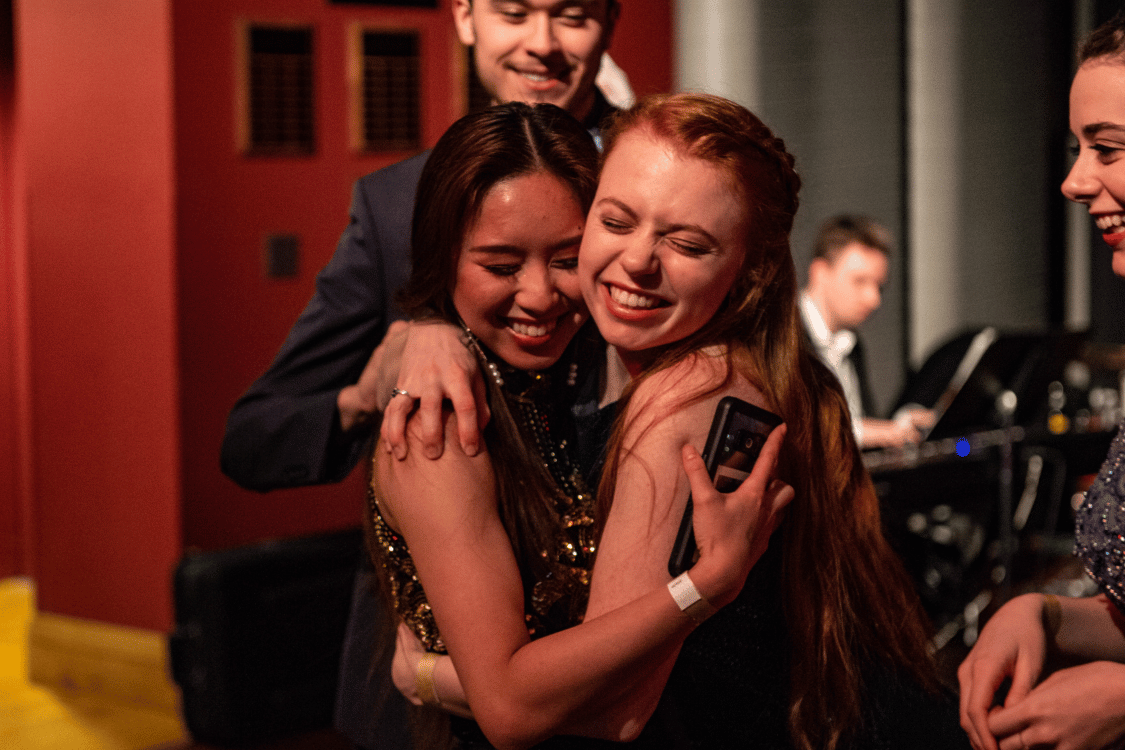 Students embracing in Hansen Student Center during Unity Gala