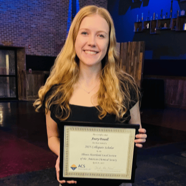 IWU student Avery Powell with certificate from American Chemical Society