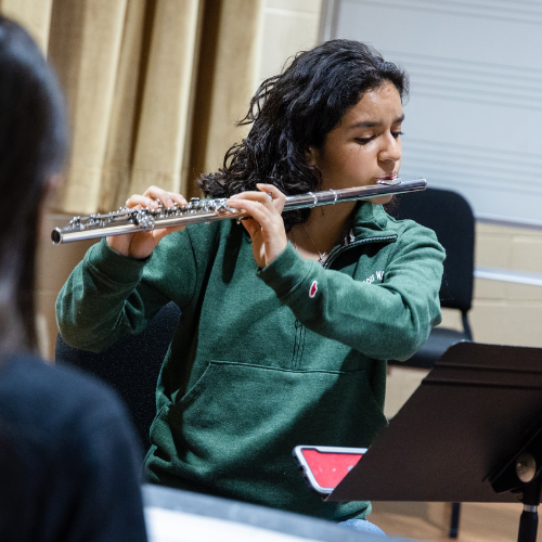 IWU student playing flute