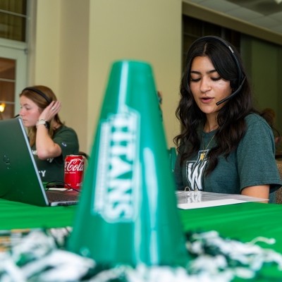 Students making calls during All In