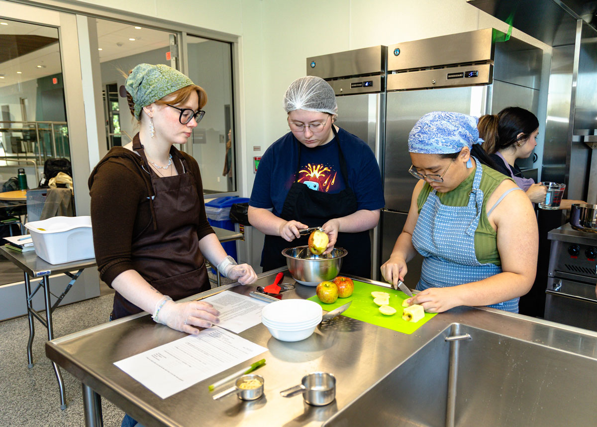 Students cooking in the Petrick Idea Center's test kitchen