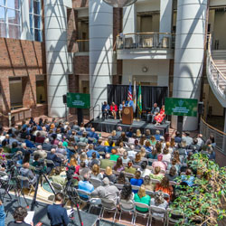 Gathering for the Fisher Quantum Center announcement.
