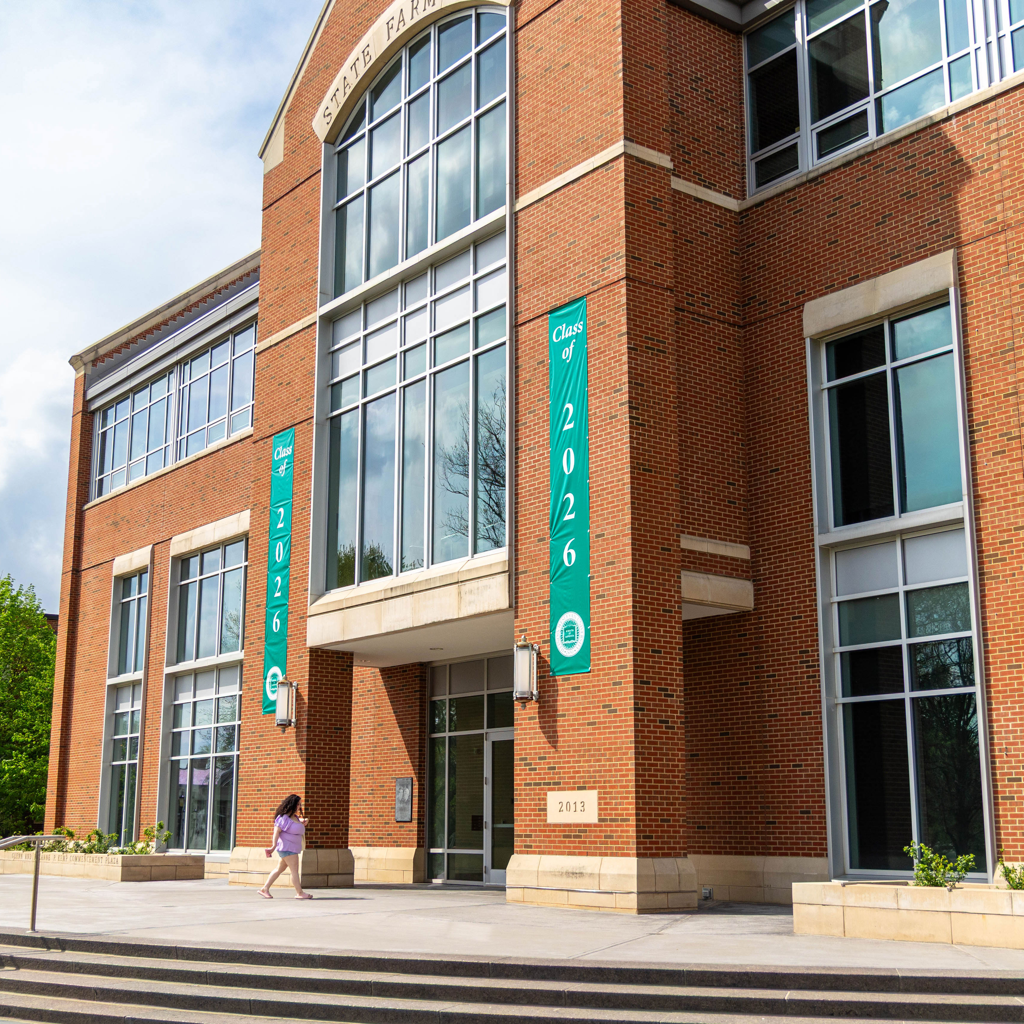 State Farm Hall with 2026 Graduation banners displayed. 