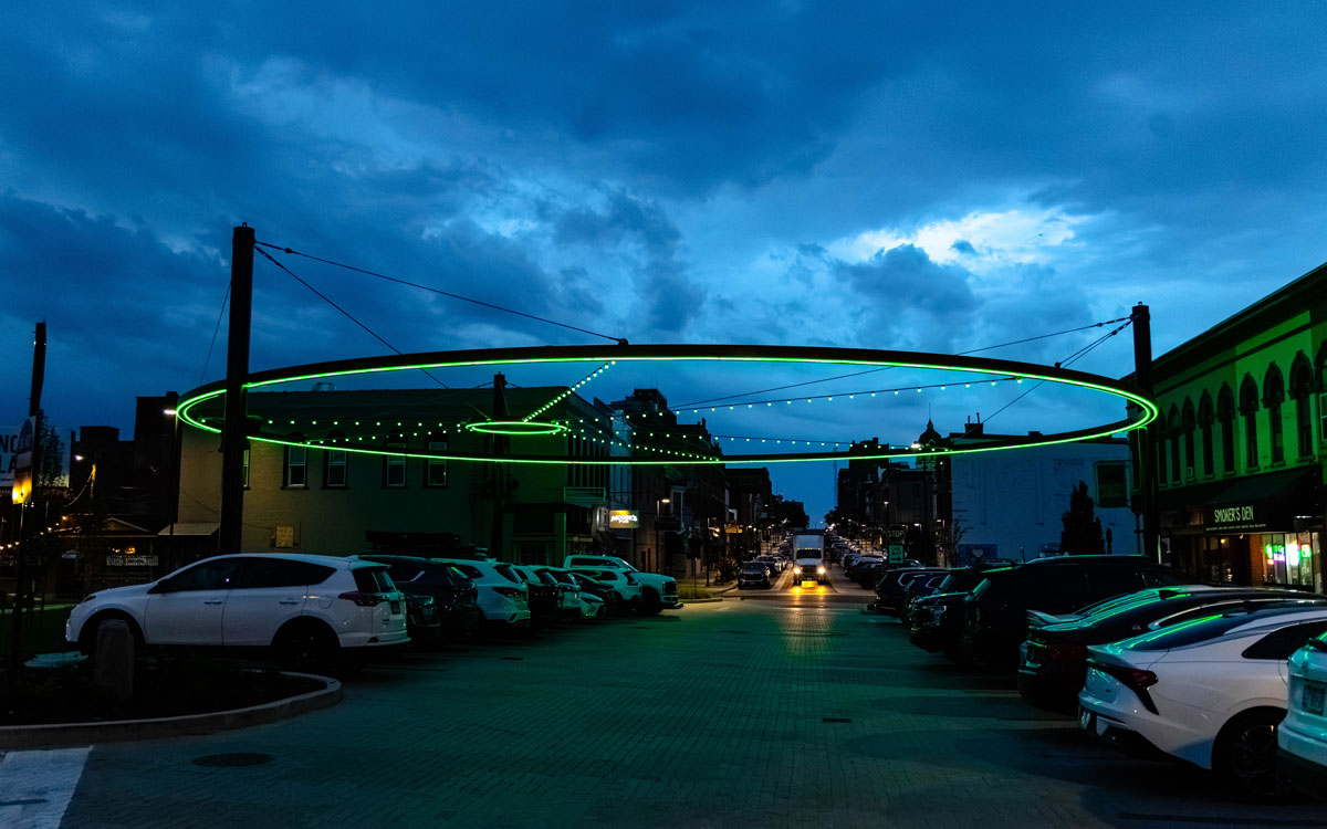 Downtown Bloomington glowing Titan Green