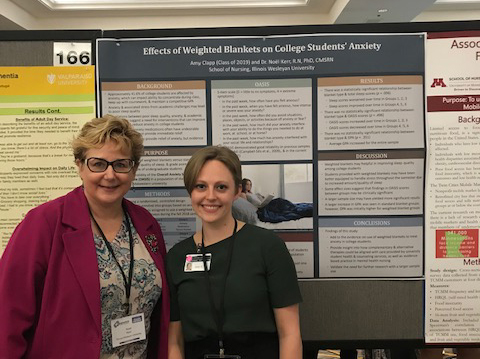 Dr. Noel Kerr (left) with Amy Clapp (right). Midwest Nursing Research Society, 43rd Annual Research Conference