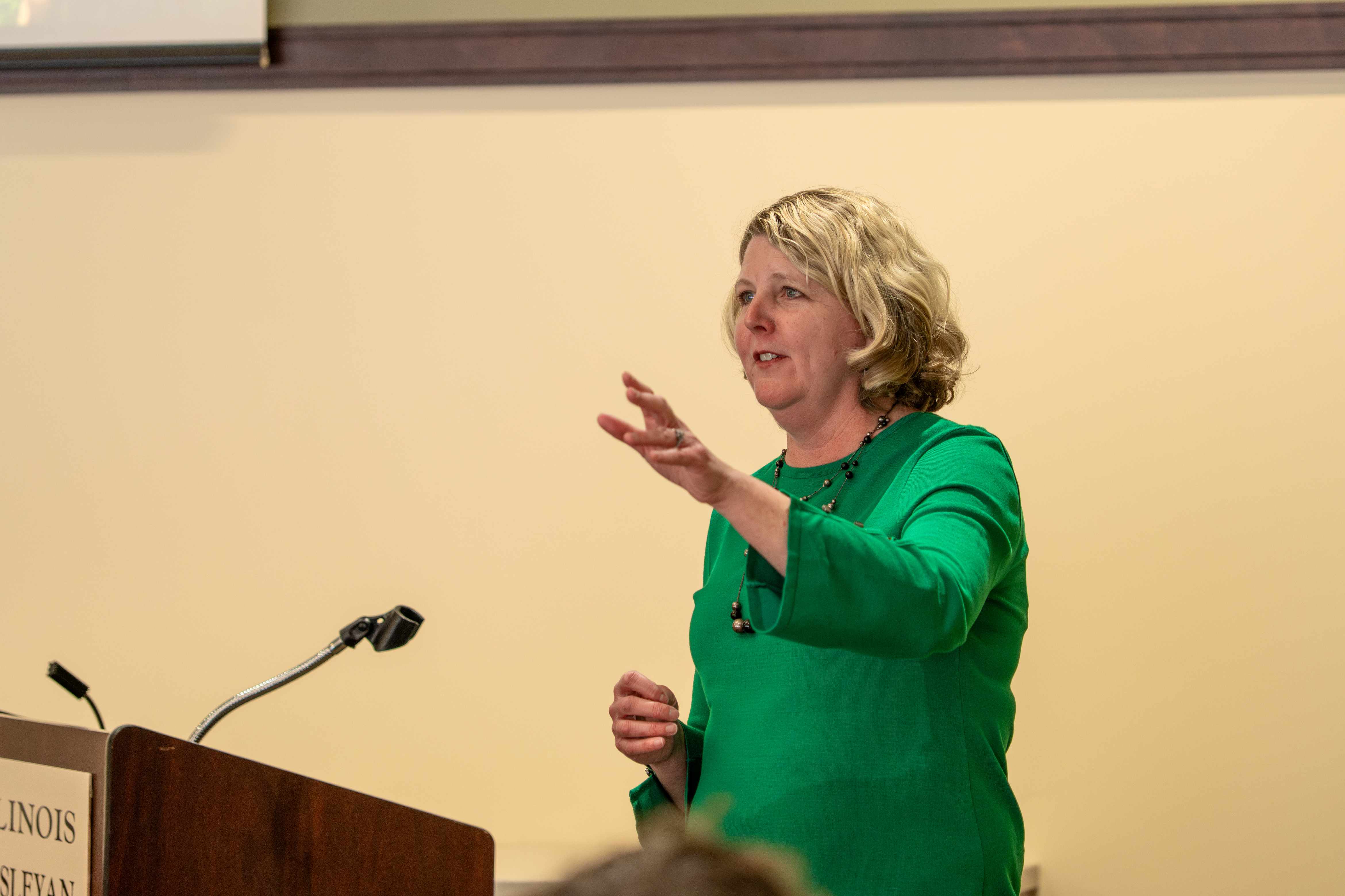 Amy Speaking at Podium