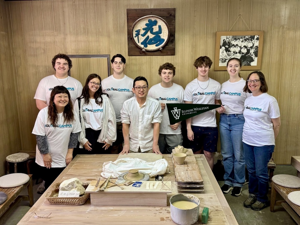 IWU Class Photo in Japan Class photo at Japanese craftsman's pottery studio.