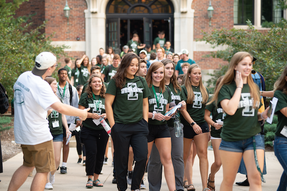 Students walking on IWU's quad.